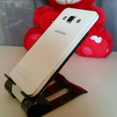 Phone stand new, black color with impressive design