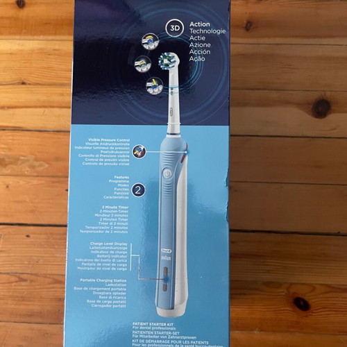 Oral B Pro 2000 electric toothbrush new with 4 heads, timer and pressure sensor