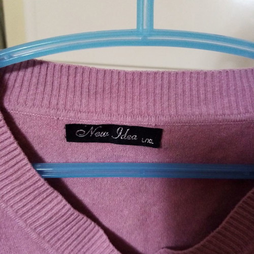 Purple sweater new, size large