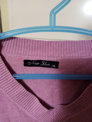 Purple sweater new, size large