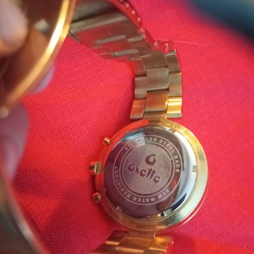 Oxette quartz stainless steel watch used, bronze tone bracelet