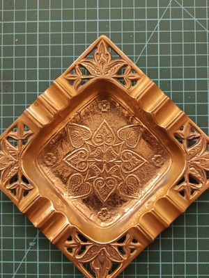 Vintage brass ashtray like new with intricate designs