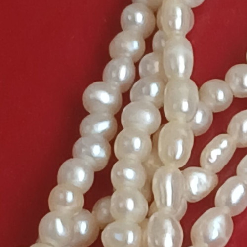 Two freshwater pearl necklaces with gold and metal clasps