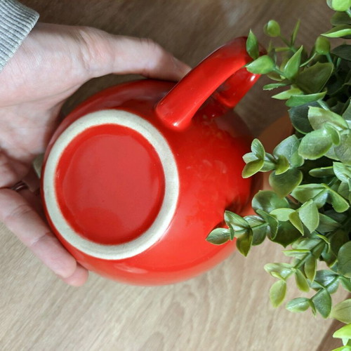 Large mug used for coffee or cereals, red