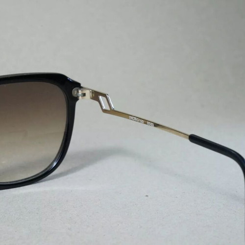 Italian Luxottica 8589 sunglasses used, black and brown