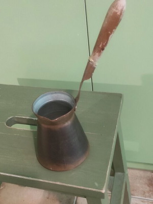 Vintage bronze briki used with large wooden handle