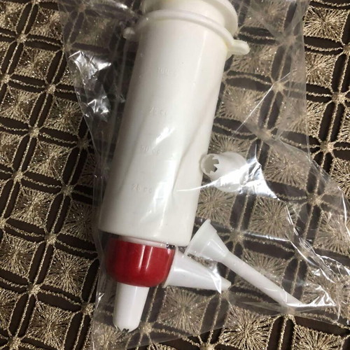 Pastry piping syringe new with 4 nozzles