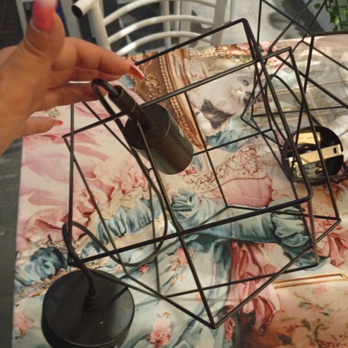 Two rhombic metal ceiling lights