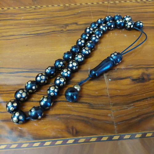 Worry beads with 33 ebony beads and golden copper inlays new