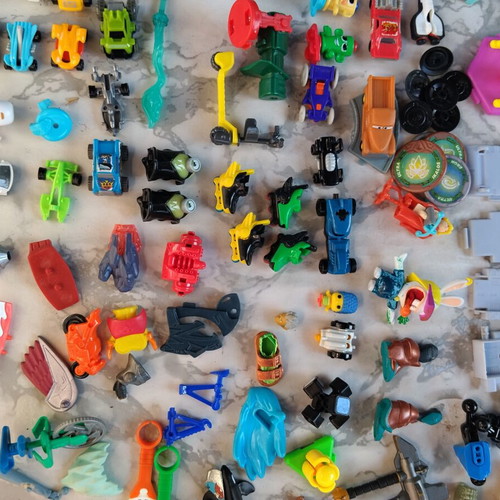 Kinder figures and miniatures used, including Bob Builder, Sonic, Rabbids