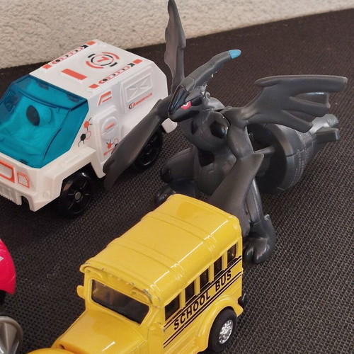 Set of children's action toys and toy cars