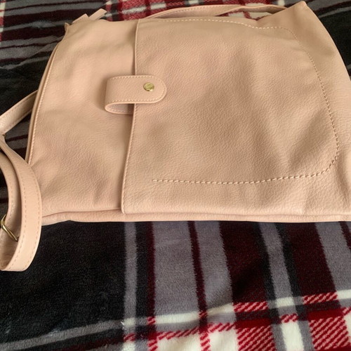Crossbody bag in nude-pink color like new