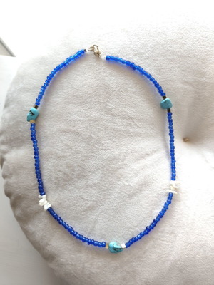 Handmade blue beaded necklace with turquoise stones, like new