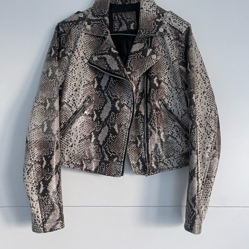 Please short leatherette jacket small like new, beige brown