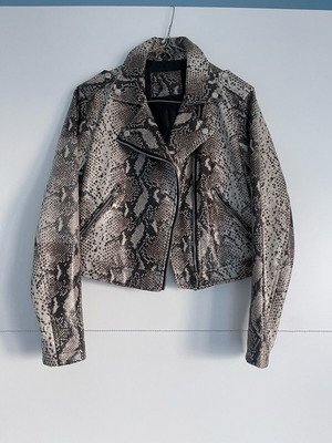 Please short leatherette jacket small like new, beige brown