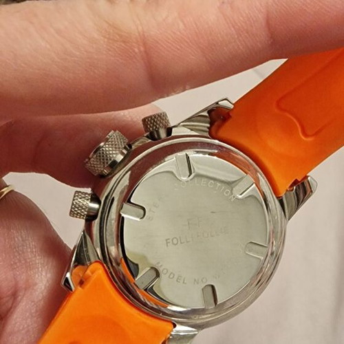 Folli Follie women's watch like new with orange dial and rubber strap