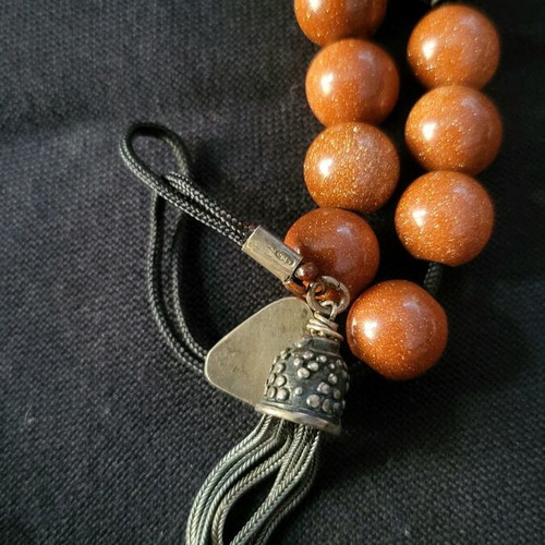 Komboloi made of goldstone and 925 silver like new