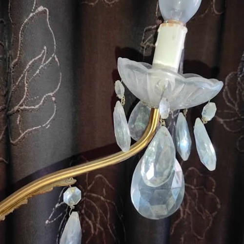 Vintage brass two-light wall sconces used with crystals