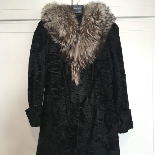Fur coat used from natural Astrakhan fur with Silver Fox collar