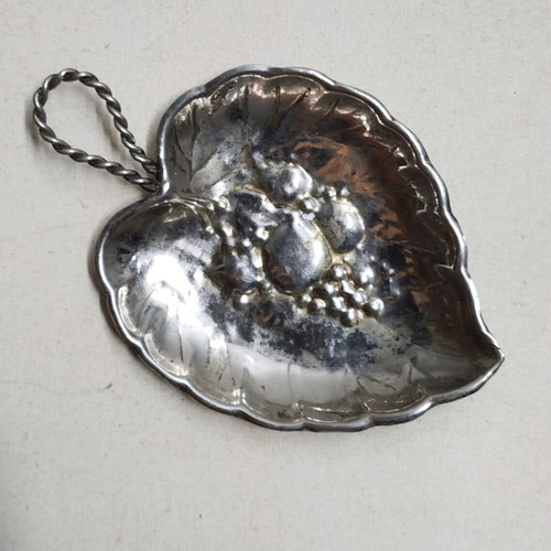 Vintage silver plated leaf-shaped plate used with embossed design