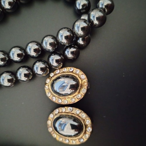 Vintage jewelry set used with black glossy beads and zircon
