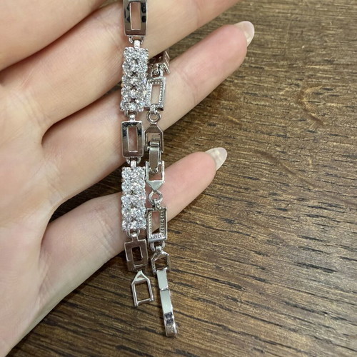 Bracelet with zirconia, new, adjustable size, silver color