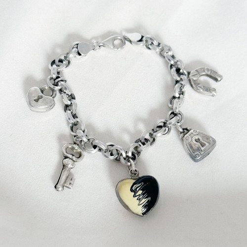 Vintage silver 925 bracelet with charms and ceramic heart used