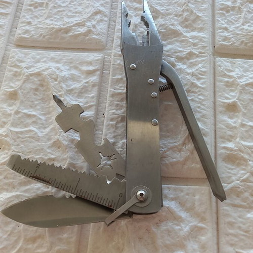 Pocket multitool used, stainless steel with case