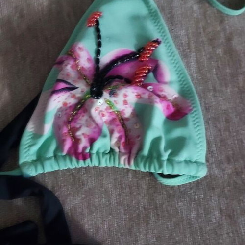 Two bikini top swimsuits used, sizes XL and L, black and multicolor