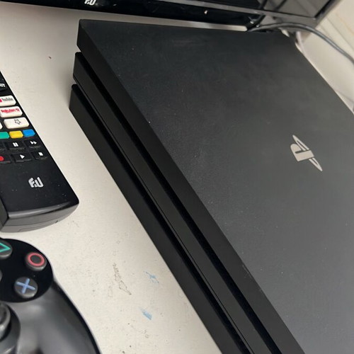 PlayStation 4 Pro like new with two controllers, 1TB storage