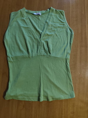 Green sleeveless v-neck top used