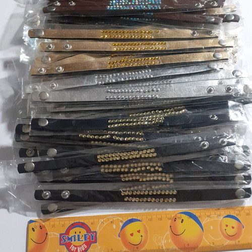 Pack of 235 denim and faux leather bracelets with rhinestones