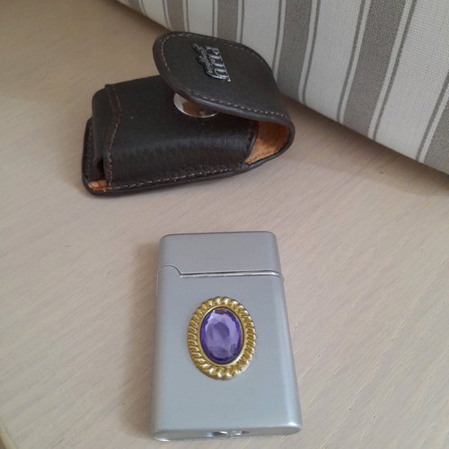 Lighter with purple gem in leather case new