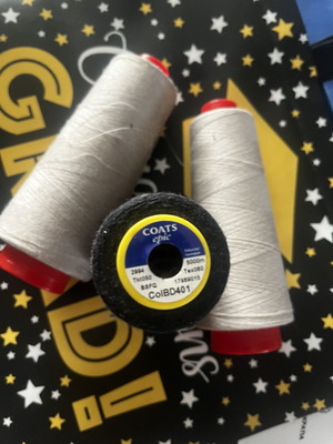 Sewing threads like new, three pieces, two ecru and one black