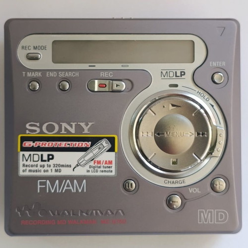 Sony MD Walkman MZ-G750 with remote, 5 discs, power supply, and battery