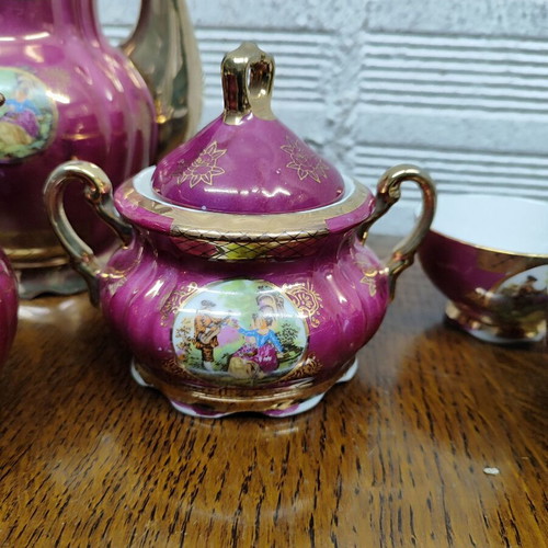 Porcelain coffee set used, 15 pieces, burgundy-fuchsia with gold details