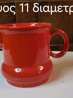 Clay decorative jug in red color like new