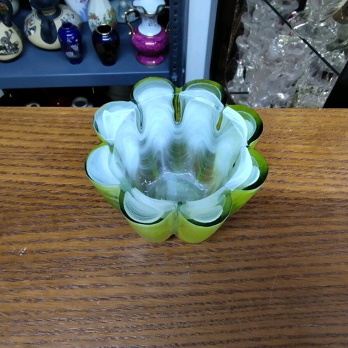 Candlestick made of solid glass in light green with veins like new
