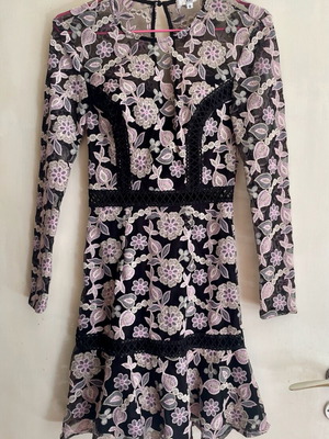 True Decadence dress like new with lining and transparent sleeves and chest