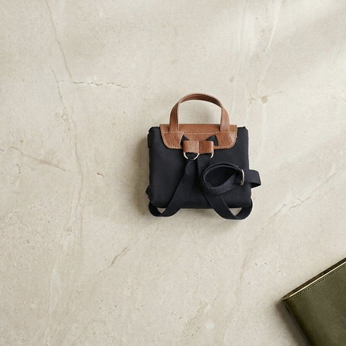 Smart foldable backpack like new, black with brown details