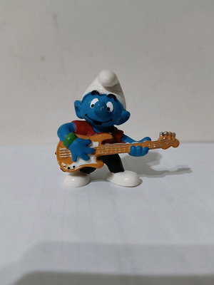 Smurf figure with guitar used Schleich 20450