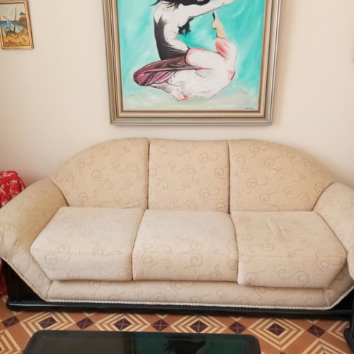 2 sofas with a free armchair