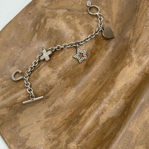 Folli Follie silver 925 bracelet like new with charms
