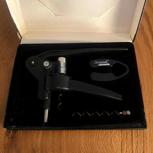 Le Creuset Screwpull Lever Professional Corkscrew used with foil cutter and spare spiral