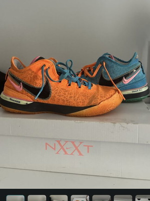 LeBron basketball shoes used, size 46, blue and orange Nike sneakers