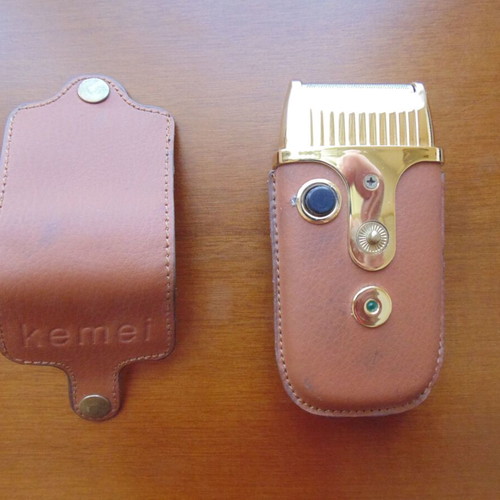 Vintage Kemei shaver used with original leather case