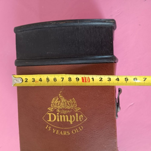 Dimple wooden trunk used with leather details