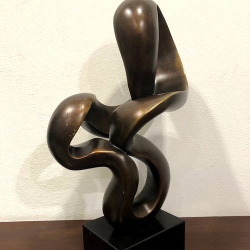 Modern sculpture used on black base, height 62cm