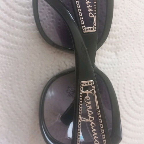 Salvatore Ferragamo sunglasses black like new with zirconia
