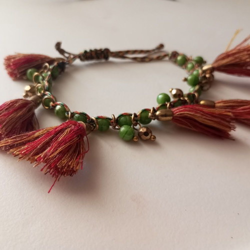 Bracelet new with green beads and red tassels boho style